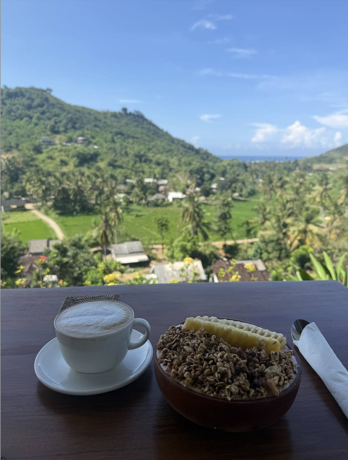 Coffee on a balcony over the rice fields