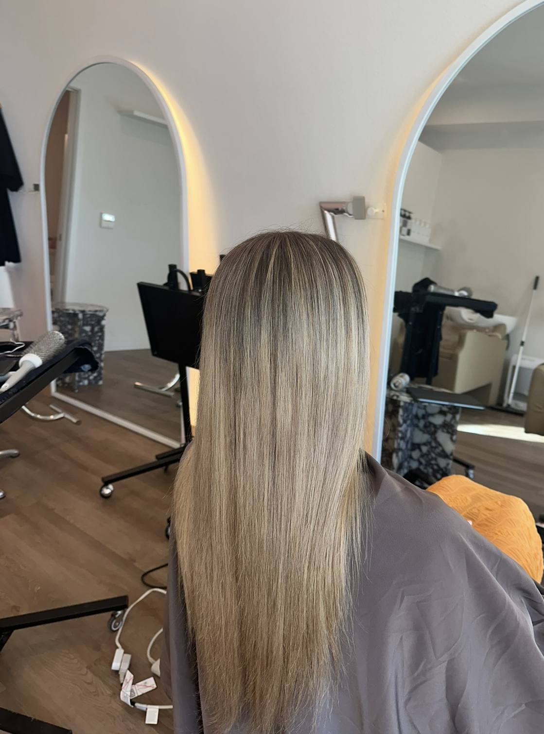 Fresh blowout in the salon mirror